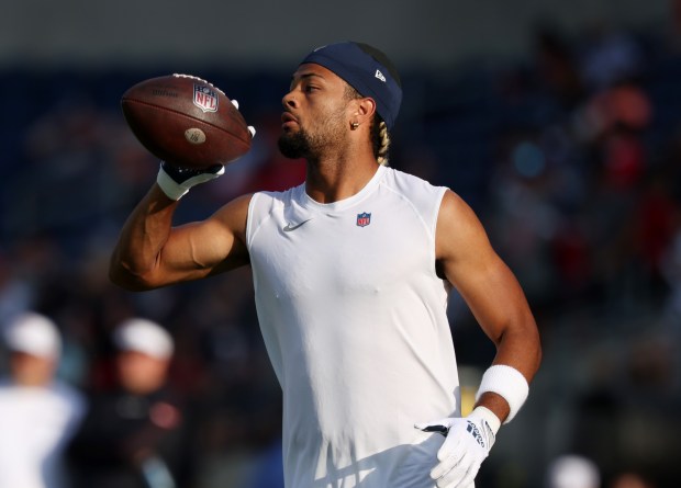 Bears wide receiver Rome Odunze warms up before the Hall of Fame Game against the Texans at Tom Benson Hall of Fame Stadium on Aug. 1, 2024, in Canton, Ohio. (John J. Kim/Chicago Tribune)