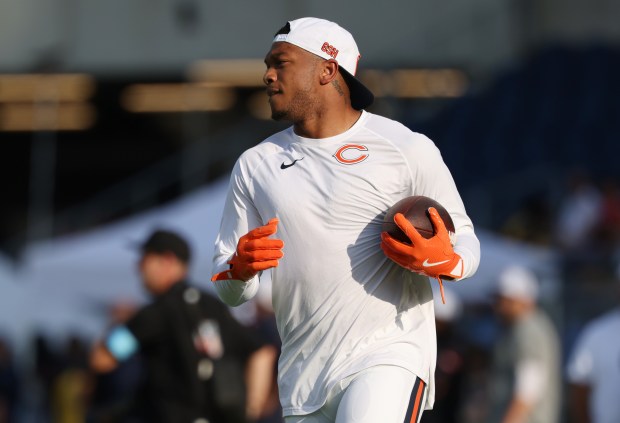 Bears wide receiver DJ Moore warms up before the Hall of Fame Game against the Texans at Tom Benson Hall of Fame Stadium on Aug. 1, 2024, in Canton. (John J. Kim/Chicago Tribune)