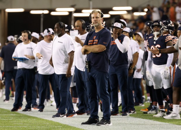 Bears coach Matt Eberflus, center, watches the second quarter against the Texans in the Pro Football Hall of Fame Game on Aug. 1, 2024, in Canton. (John J. Kim/Chicago Tribune)