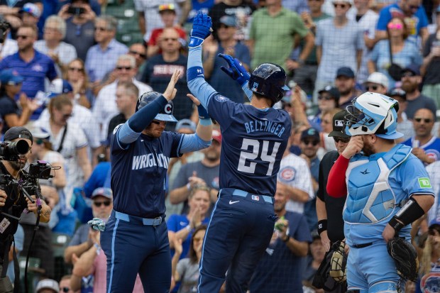 Chicago Cubs right fielder Cody Bellinger (24) celebrates after hitting a two-run home run in the first inning against the Toronto Blue Jays at Wrigley Field in Chicago on Aug. 16, 2024. The Cubs won 6-5 against the Toronto Blue Jays. (Tess Crowley/Chicago Tribune)