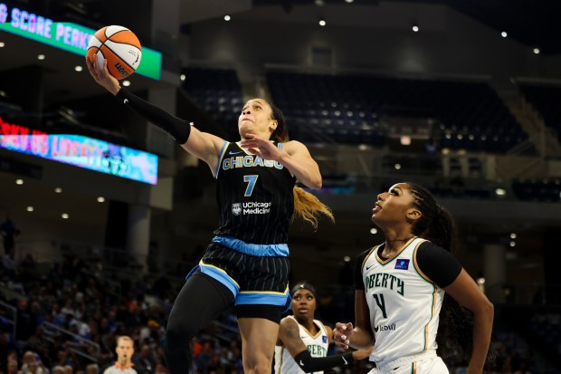 Sky guard Chennedy Carter gets past the Liberty's Jessika Carter during their game at Wintrust Arena on May 7, 2024. (Eileen T. Meslar/Chicago Tribune)