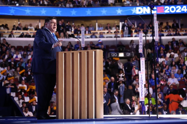 Illinois Gov. JB Pritzker address the delegates on Aug. 20, 2024, during the Democratic National Convention at the United Center. (Brian Cassella/Chicago Tribune)