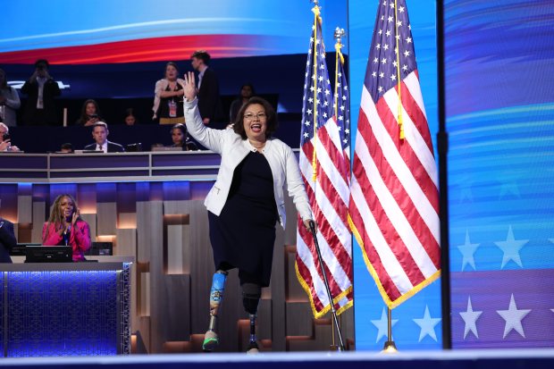 Illinois Senator Tammy Duckworth takes the stage, Tuesday, Aug. 20, 2024, during the Democratic National Convention at the United Center. (Brian Cassella/Chicago Tribune)