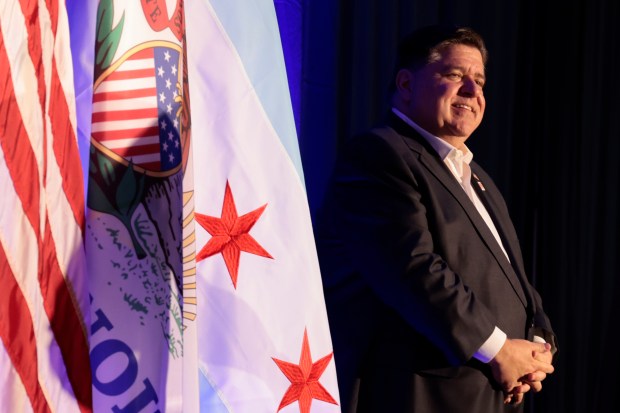 Gov. JB Pritzker listens to speakers at the Illinois' Presidential Delegation's first of several daily breakfasts at Chicago's Royal Sonesta Hotel Downtown, Monday, Aug. 19, 2024. (Antonio Perez/Chicago Tribune)