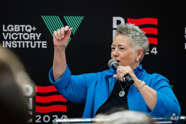 President and CEO of LGBTQ+ Victory Institute president Annise Parker talks to the audience at an event organized by LGBTQ+ Victory Institute to celebrate the historic number of LGBTQ+ identifying delegates at the Democratic National Convention on the rooftop at theWit Chicago on Aug. 20, 2024. (Tess Crowley/Chicago Tribune)