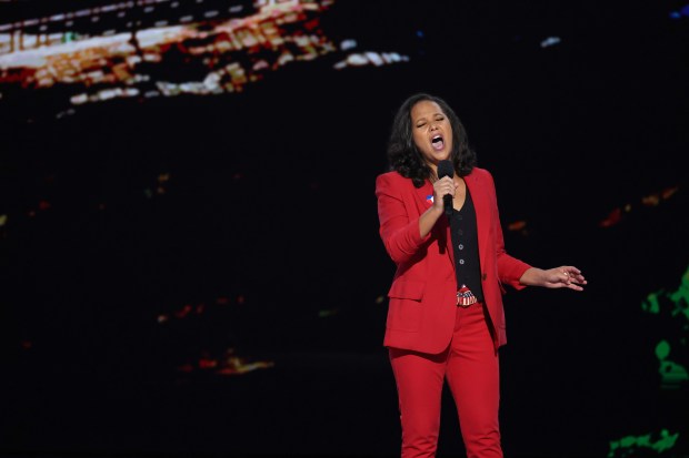 Jess Davis, the 2019 Minnesota Teacher of the Year, sings the national anthem at the Democratic National Convention at the United Center in Chicago on Wednesday, Aug. 21, 2024. (Chris Sweda/Chicago Tribune)