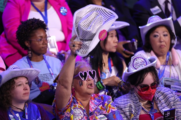 The crowd cheers during the Democratic National Convention at the United Center in Chicago on Aug. 21, 2024. (Chris Sweda/Chicago Tribune)