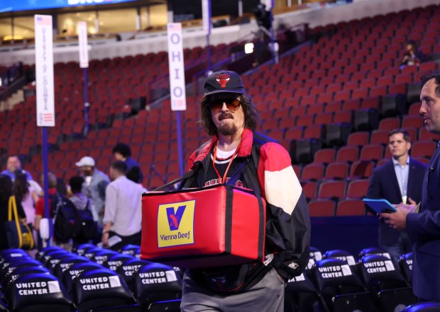 Stephen Colbert tapes a Late Show segment dressed as a Bulls hot dog vendor Sunday, Aug. 18, 2024, before the Democratic National Convention at the United Center. (Brian Cassella/Chicago Tribune)