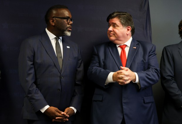 Mayor Brandon Johnson and Gov. J.B. Pritzker speak during a press conference at the United States Secret Service Field Office regarding the security measures for the 2024 Democratic National Convention on July 25, 2024. (Eileen T. Meslar/Chicago Tribune)