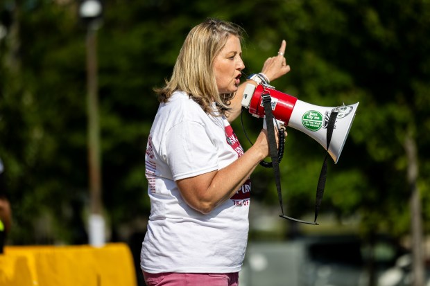 Alexis Pleus, director of Trail of Truth, a substance abuse prevention coalition, speaks at Park #578 in Chicago on Aug. 21, 2024. (Tess Crowley/Chicago Tribune)