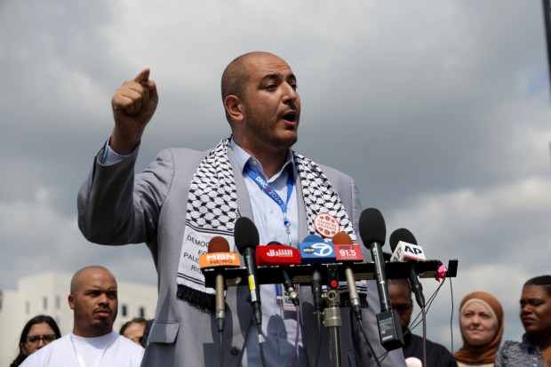 Abbas Alawieh, an uncommitted delegate at the Democratic National Convention, speaks about the need of Democratic leaders to stop supplying weapons to Israel during a gathering of progessive leaders at Park 578 on Aug. 21. 2024, in Chicago. (Stacey Wescott/Chicago Tribune)