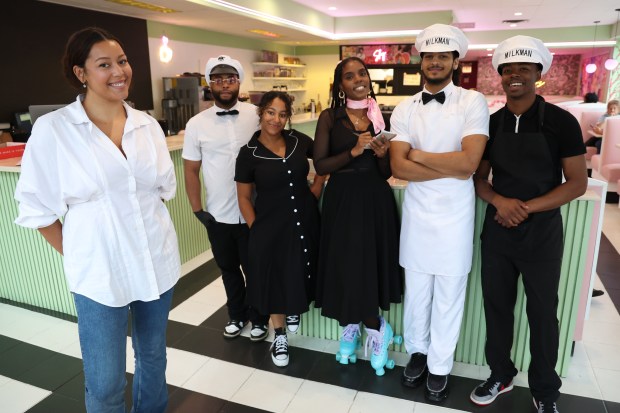 Dahlia Beckett, left, a partner in the diner Stussy's, 3500 S. Halsted Street in Chicago, is seen with employees on Thursday, Aug. 15, 2024. (Terrence Antonio James/Chicago Tribune)