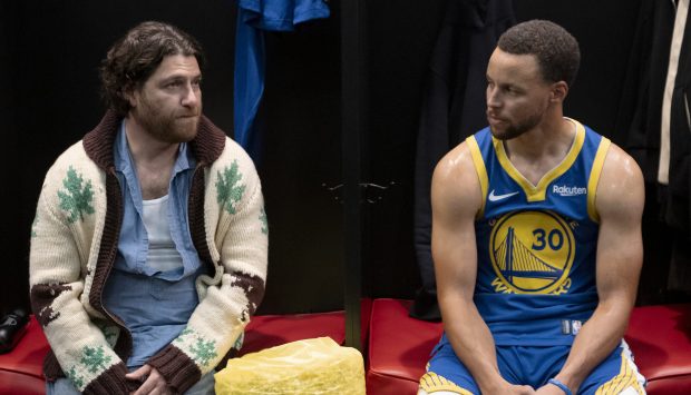 From left: Adam Pally as Danny, Stephen Curry as himself in "Mr. Throwback." (David Moir/Peacock)