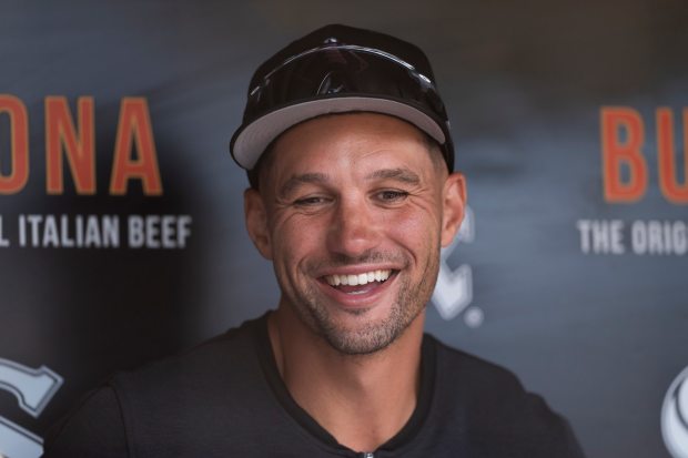 White Sox interim manager Grady Sizemore smiles in the dugout before a game against the Yankees at Guaranteed Rate Field on Monday, Aug. 12, 2024. (Matt Dirksen/Getty Images)