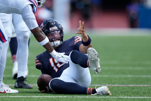 Bears quarterback Caleb Williams reacts after a first-half run in a preseason game against the Bills on Saturday, Aug. 10, 2024, in Orchard Park, NY. (AP Photo/Seth Wenig)