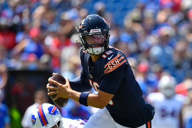 Chicago Bears quarterback Caleb Williams looks to throw during the first half of an preseason NFL football game against the Buffalo Bills, Saturday, Aug. 10, 2024, in Orchard Park, NY. (AP Photo/Adrian Kraus)