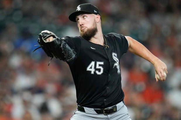 Chicago White Sox starting pitcher Garrett Crochet throws against the Houston Astros during the first inning of a baseball game Friday, Aug. 16, 2024, in Houston. (AP Photo/Eric Christian Smith)