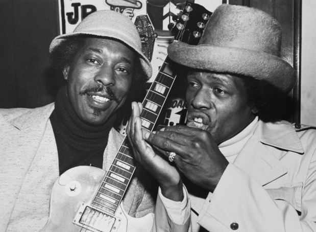 Buddy Guy, left, and Junior Wells together at the Checkerboard Lounge in Chicago in January 1981. (Steve Kagan/Getty Images)