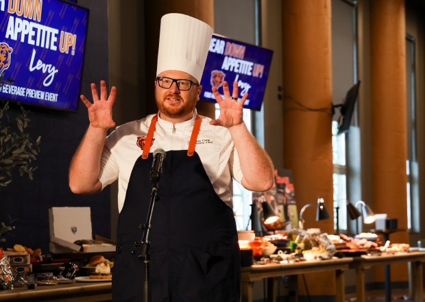 Levy Chef Ryan Craig speaks during a tasting event and hospitality exhibition at Soldier Field on Wednesday, Aug. 28, 2024, featuring new concession food items. (Eileen T. Meslar/Chicago Tribune)