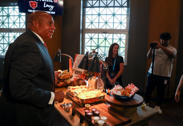 Chicago Bears President and Chief Executive Officer Kevin Warren checks out the new concession items during a tasting event and hospitality exhibition hosted by the Chicago Bears and Levy at Soldier Field on Wednesday, Aug. 28, 2024. (Eileen T. Meslar/Chicago Tribune)