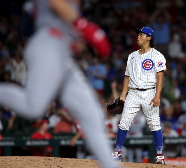 Chicago Cubs pitcher Shota Imanaga stands on the mound after giving up a 2-run home run to St. Louis Cardinals shortstop Masyn Winn in the seventh inning of a game at Wrigley Field in Chicago on Aug. 1, 2024. (Chris Sweda/Chicago Tribune)