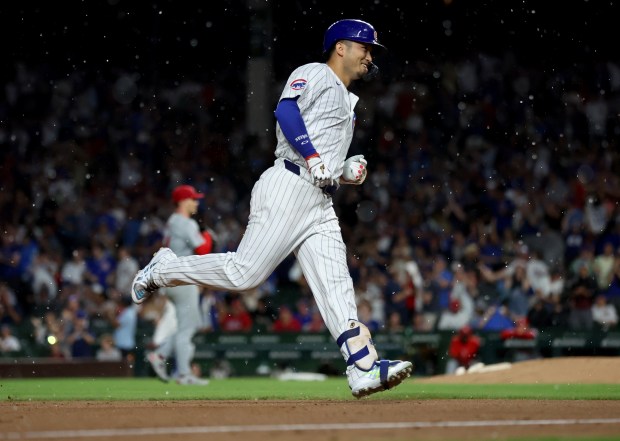 Chicago Cubs outfielder Seiya Suzuki (27) rounds the bases after hitting a solo home run in the sixth inning of a game against the St. Louis Cardinals at Wrigley Field in Chicago on Aug. 1, 2024. (Chris Sweda/Chicago Tribune)