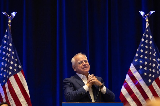 Democratic vice president nominee Minnesota Gov. Tim Walz makes a surprise appearance and speech during the Women's Caucus at the Democratic National Convention at McCormick Place on Aug. 20. 2024, in Chicago . (Stacey Wescott/Chicago Tribune)