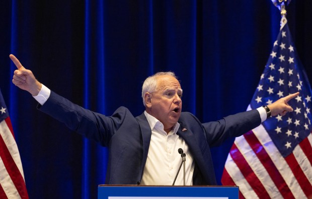 Democratic vice president nominee Minnesota Gov. Tim Walz makes a surprise appearance and speech during the Women's Caucus at the Democratic National Convention at McCormick Place on Aug. 20. 2024, in Chicago. (Stacey Wescott/Chicago Tribune)