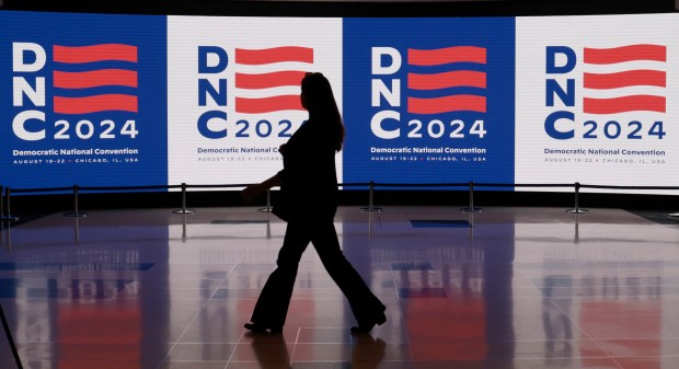 Video screens before the start of the Democratic National Committee's walkthrough at the United Center on April 17, 2024. (Antonio Perez/Chicago Tribune)