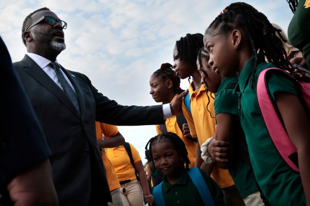 Mayor Brandon Johnson welcomes students back to school at Chalmers Elementary Specialty School on Monday, Aug. 26, 2024. (Antonio Perez/Chicago Tribune)