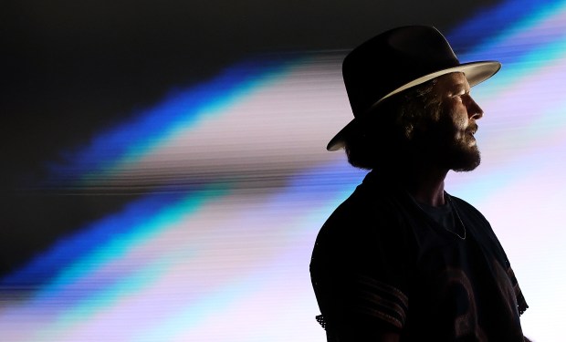 Eddie Vedder leads Pearl Jam during the Dark Matter World Tour at Wrigley Field in Chicago on Aug. 29, 2024. (Chris Sweda/Chicago Tribune)