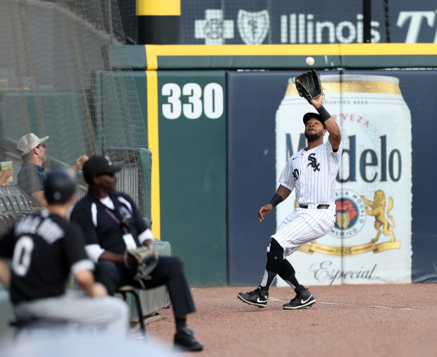 Chicago White Sox left fielder Corey Julks catches a fly ball to end the top of the fifth inning against the Texas Rangers at Guaranteed Rate Field in Chicago on Aug. 28, 2024. (Chris Sweda/Chicago Tribune)