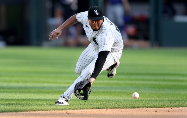 Chicago White Sox second baseman Lenyn Sosa (50) tries to field a ground ball in the sixth inning of a game against the Texas Rangers at Guaranteed Rate Field in Chicago on Aug. 28, 2024. (Chris Sweda/Chicago Tribune)