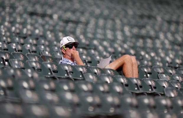 A Chicago White Sox fan takes in the action in the second inning of a game between the Sox and the Texas Rangers at Guaranteed Rate Field in Chicago on Aug. 28, 2024. (Chris Sweda/Chicago Tribune)