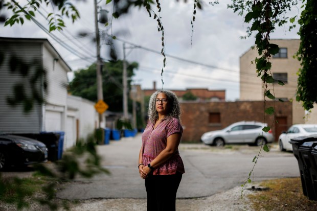 Jennifer Leigh Husbands, 51, poses for a portrait near her home on Aug. 1, 2024, in Chicago. Husbands' mother is from Michigan and her father is from Barbados. (Armando L. Sanchez/Chicago Tribune)