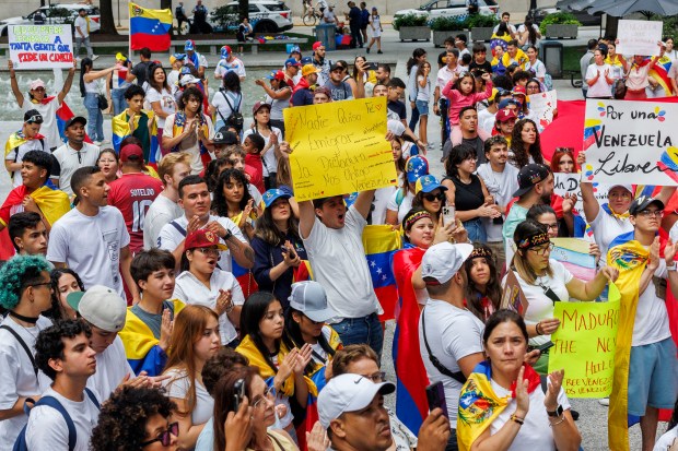 Venezuelans and supporters gather in Daley Plaza to protest President Nicolás Maduro after authorities declared Maduro the victor in last Sunday's election against oppositional presidential candidate Edmundo González, Aug. 6, 2024 in Chicago. (Armando L. Sanchez/Chicago Tribune)