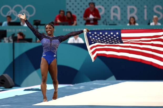 Gold medalist Simone Biles of Team United States celebrates after competing in the Artistic Gymnastics Women's All-Around Final on day six of the Olympic Games Paris 2024 at Bercy Arena on Aug. 01, 2024 in Paris, France. (Photo by Naomi Baker/Getty Images)