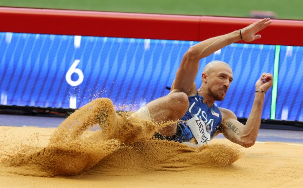 USA decathlete Zach Ziemek hits the sandpit in the long jump on Aug. 2, 2024, at Stade de France during the Paris Olympics. (Brian Cassella/Chicago Tribune)