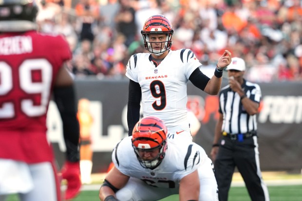 Bengals quarterback Joe Burrow signals for motion during a preseason game against the Buccaneers on Aug. 10, 2024, in Cincinnati. (Jason Mowry/Getty)