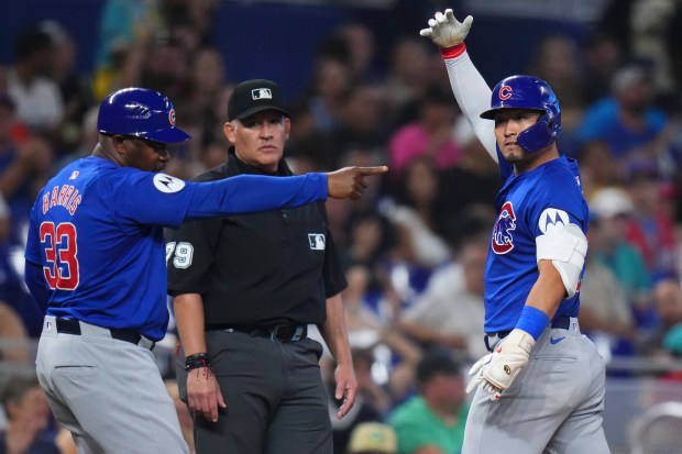 Cubs right fielder Seiya Suzuki celebrates after hitting a triple against the Marlins in the seventh inning on Aug. 24, 2024, in Miami. (Rich Storry/Getty)