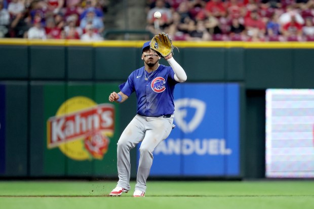 Cubs third baseman Isaac Paredes fields a ball during the sixth inning against the Reds on July 30, 2024, at Great American Ball Park in Cincinnati. (Kirk Irwin/Getty)