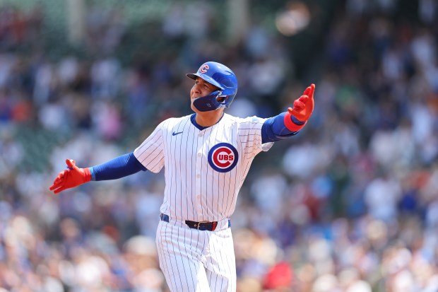 Cubs catcher Miguel Amaya rounds the bases after hitting a grand slam in the second inning against the Tigers on Aug. 22, 2024, at Wrigley Field. (Stacy Revere/Getty Images)