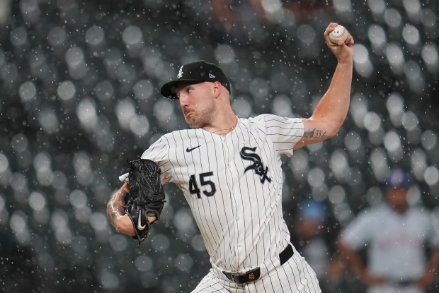 Chicago White Sox starting pitcher Garrett Crochet throws against the Texas Rangers during the first inning of a baseball game, Tuesday, Aug. 27, 2024, in Chicago. (AP Photo/Erin Hooley)