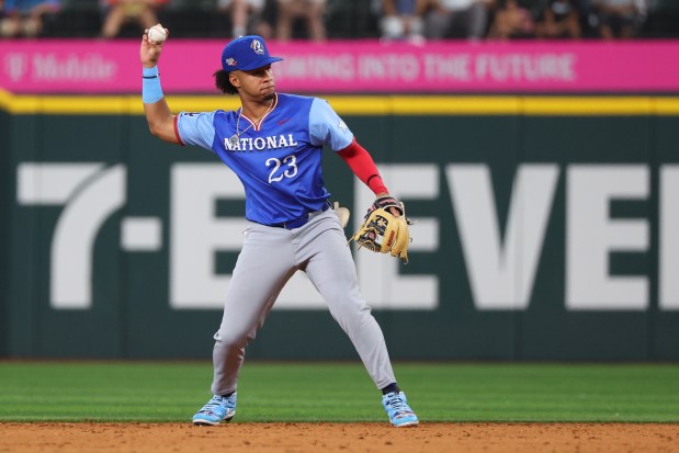 The Dodgers' Jeral Perez throws the ball to first base during the seventh inning of the All-Star Futures Game at Globe Life Field on July 13, 2024, in Arlington, Texas. (Richard Rodriguez/Getty Images)