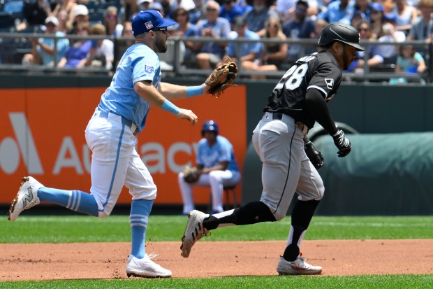 White Sox left fielder Tommy Pham is caught in a run-down by Royals second baseman Garrett Hampson during the first inning on July 21, 2024, in Kansas City, Mo. (AP Photo/Reed Hoffmann)