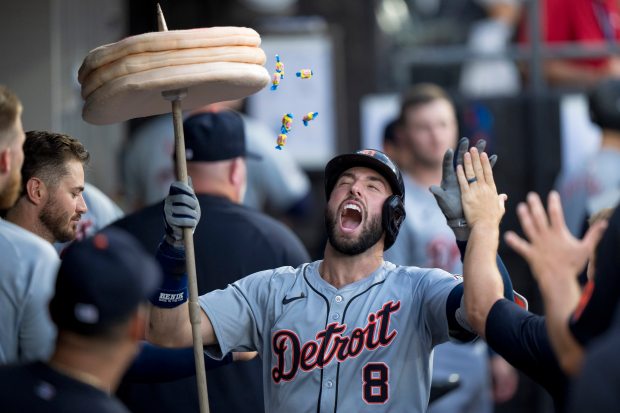 Tigers right fielder Matt Vierling celebrates in the dugout after hitting a home run in the third inning against the White Sox on Aug. 24, 2024, at Guaranteed Rate Field. (Matt Dirksen/Getty Images)