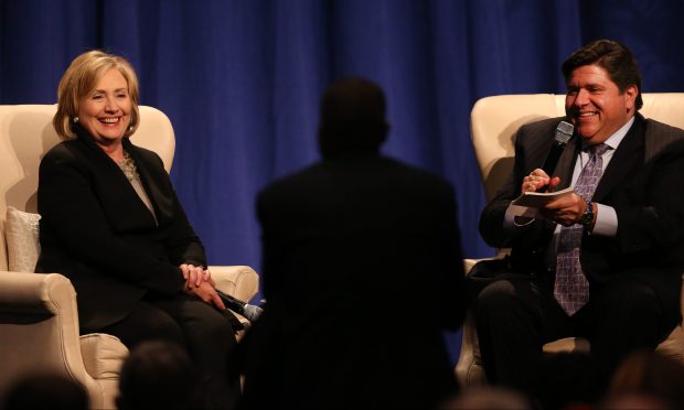 Hillary Rodham Clinton has a laugh with JB Pritzker at a dinner hosted by the Economic Club of Chicago at the Fairmont Chicago on Oct. 8, 2014. (Chris Sweda/Chicago Tribune)