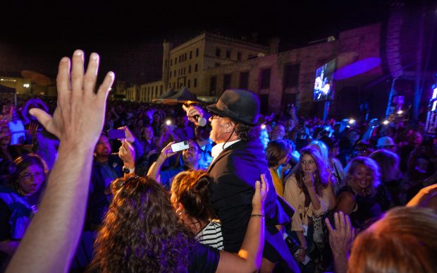 Jim Belushi makes his way into the crowd at Blues Brothers Con at the Old Joliet Prison in Joliet on Aug. 19, 2022. (Vincent D. Johnson/for the Chicago Tribune)