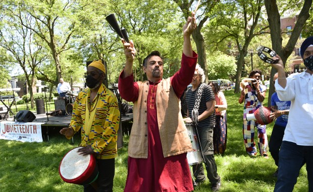 The musical group Funkadesi performs during Evanston's Juneteenth celebration on June 18, 2022. The music group will perform Aug. 20 in Daley Plaza for "Celebrating Chicago." (Karie Angell Luc / Pioneer Press)