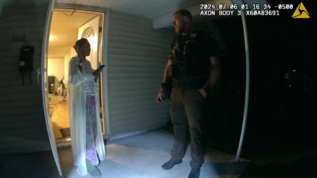 In this image taken from body camera video released by Illinois State Police, Sonya Massey, left, talks with former Sangamon County Sheriff's Deputy Sean Grayson outside her home in Springfield, Ill., July 6, 2024. Footage released Monday, July 22, by a prosecutor reveals a chaotic scene in which Massey, who called 911 for help, is shot in the face in her home by Grayson. (Illinois State Police via AP)